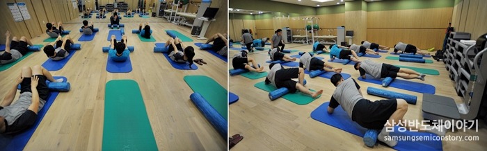 폼 롤러 운동에 열중하는 임직원들
