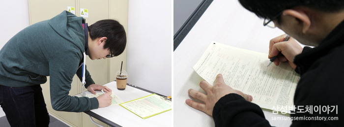 헌혈 기록 카드를 작성하는 임직원들